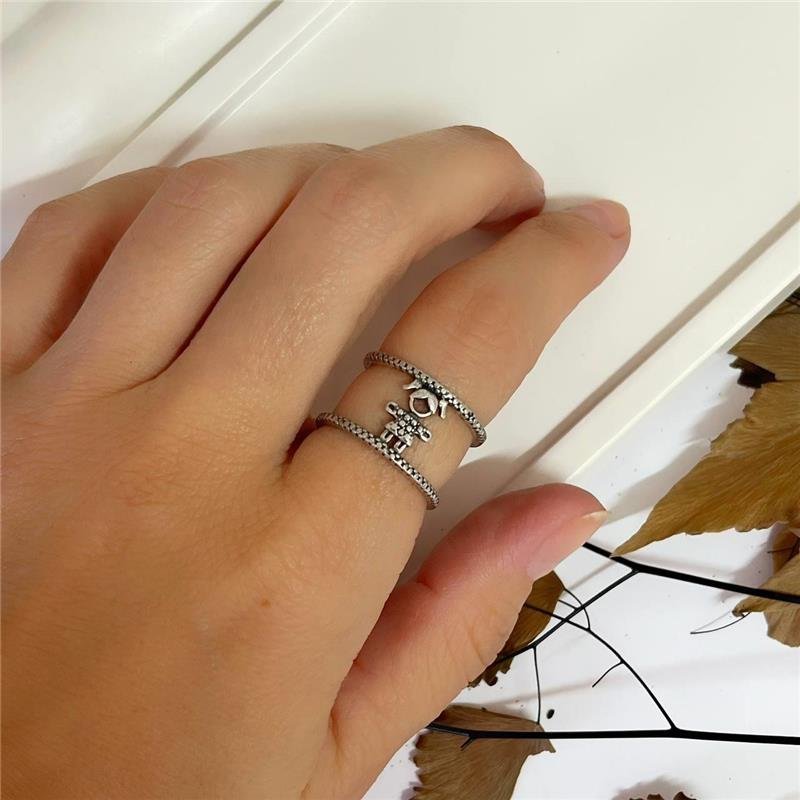 ANEL PRATA 925 DUPLO MENINA NO MEIO