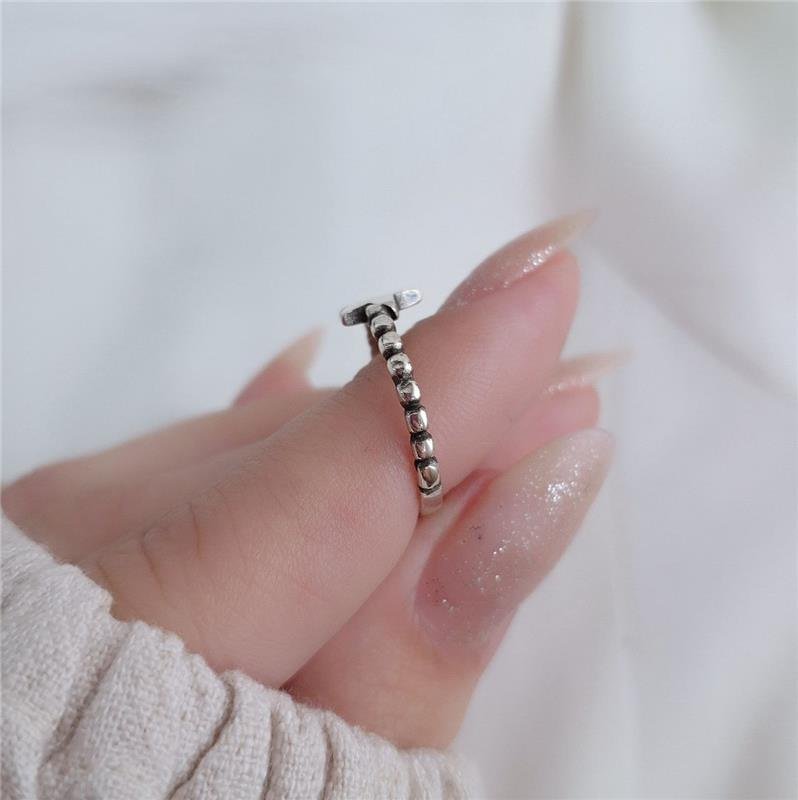 ANEL PRATA 925 ESTRELA COM BOLINHAS