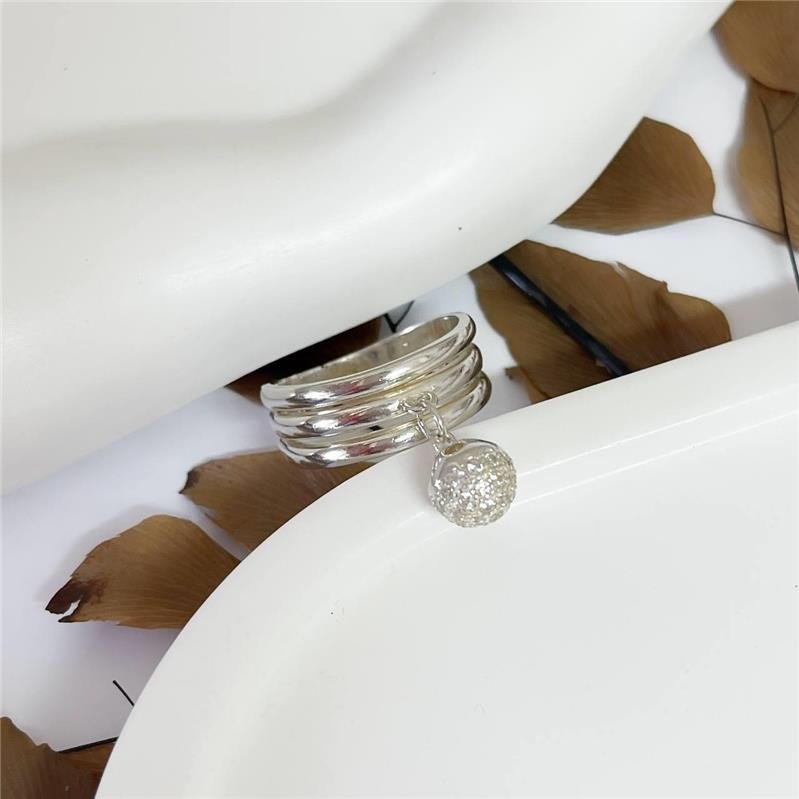 ANEL PRATA 925 LINHAS SEPARADAS BOLINHA CRAVEJADA PENDURADA