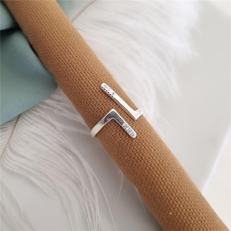 ANEL PRATA 925 REGULÁVEL DOIS L CRAVEJADO