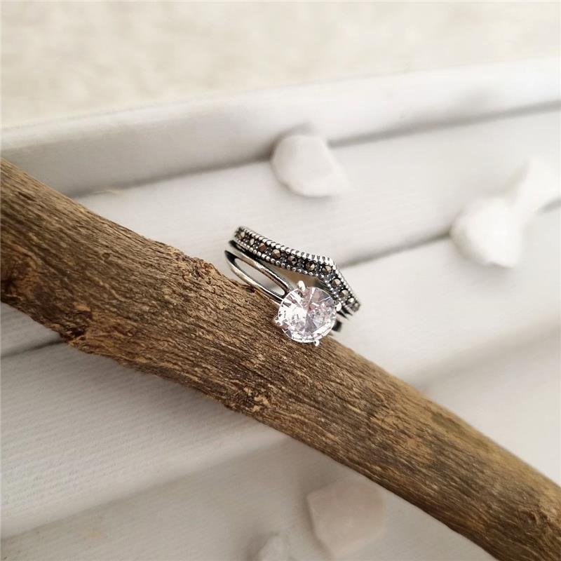 ANEL PRATA 925 SOLITÁRIO INFINITO COM BICO CRAVEJADO