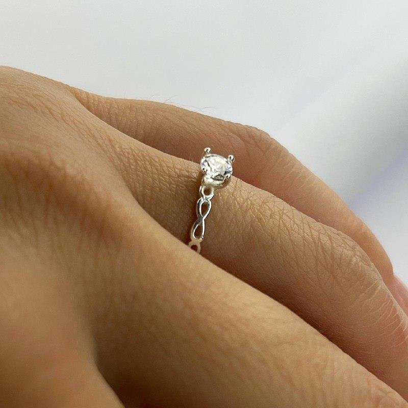 ANEL PRATA 925 SOLITÁRIO INFINITO LATERAIS ZIRCÔNIA ALTA