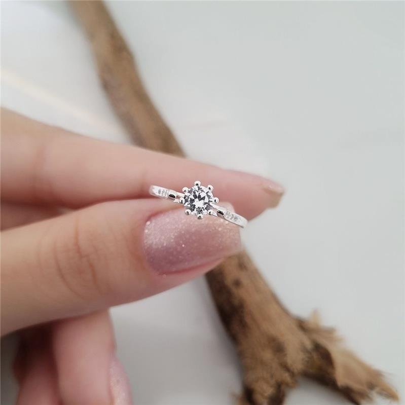 ANEL PRATA 925 SOLITARIO GARRAS LATERAL CRAVEJADA