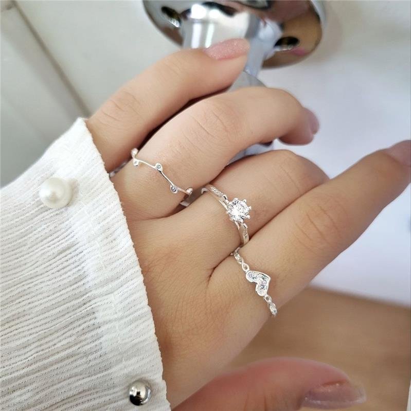 ANEL PRATA 925 SOLITARIO GARRAS LATERAL CRAVEJADA