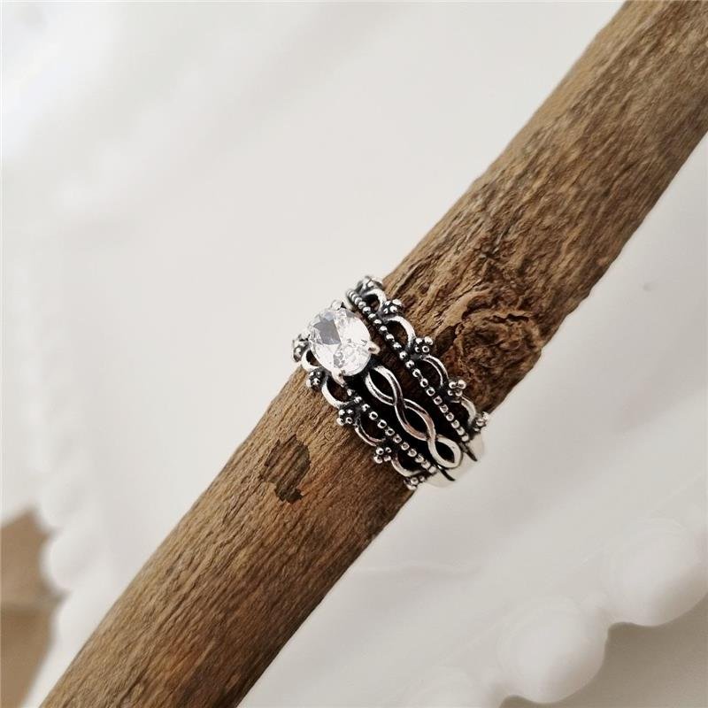 ANEL PRATA 925 SOLITÁRIO OVAL TRIPLO INFINITOS E ROCOCÓ