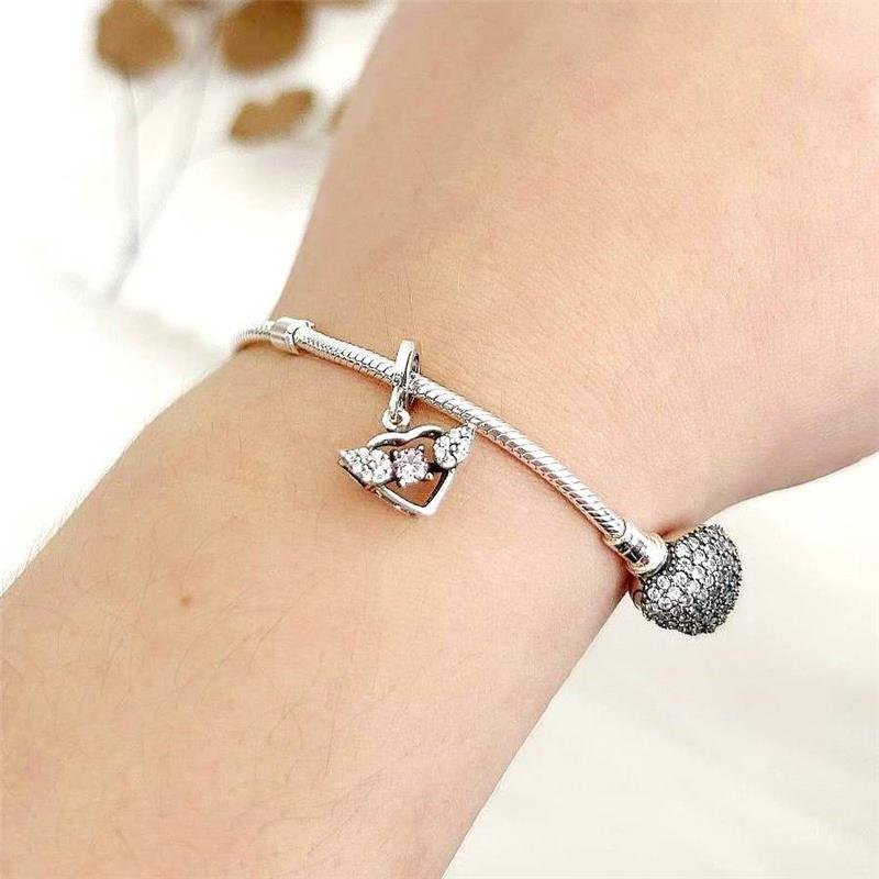 BERLOQUE PRATA 925 CORAÇÃO COM ASAS CRAVEJADO