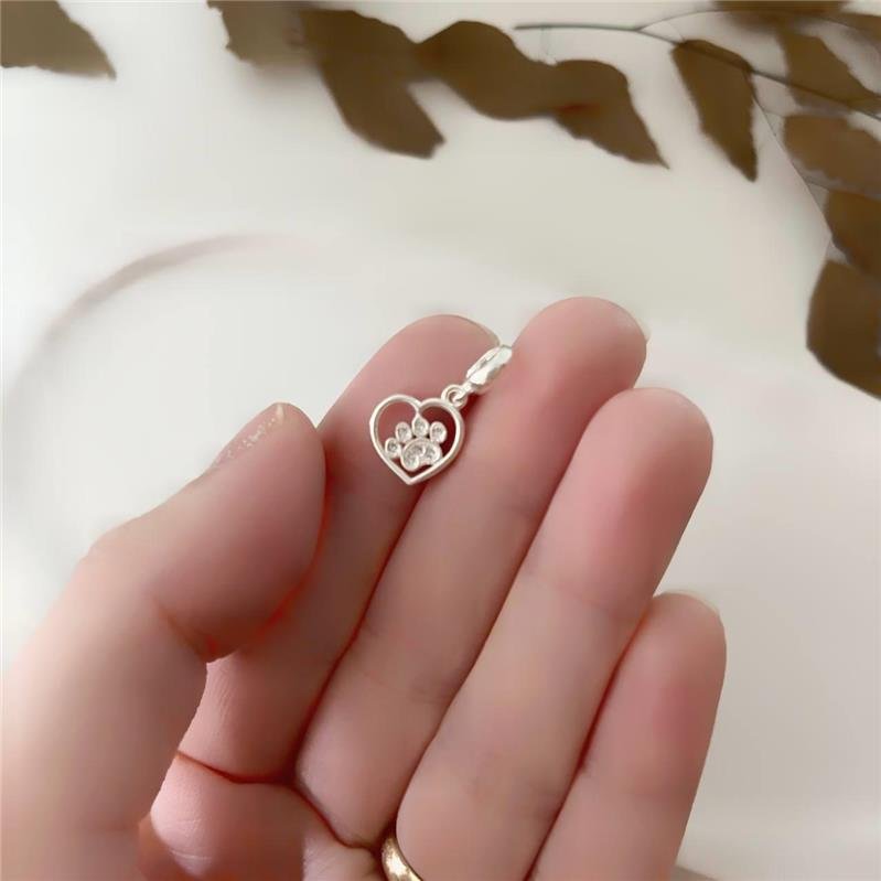 BERLOQUE PRATA 925 CORAÇÃO VAZADO PATINHA PET CRAVEJADA