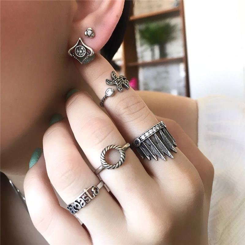 BRINCO PRATA 925 FLOR TRÊS PÉTALAS PEQUENA