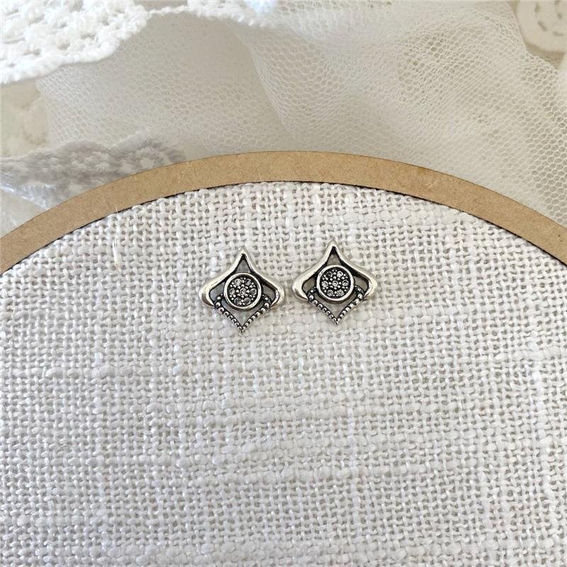 BRINCO PRATA 925 FORMAS CURVAS BICOS