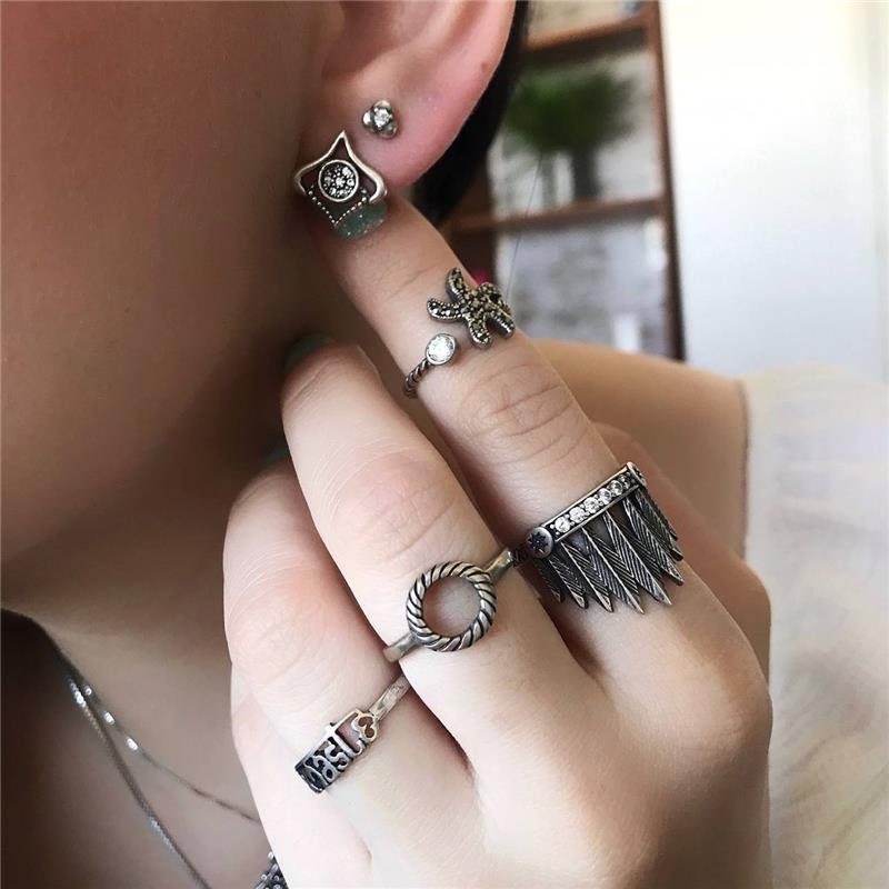 BRINCO PRATA 925 FORMAS CURVAS BICOS