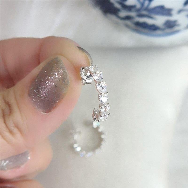 BRINCO PRATA 925 MEIA ARGOLA CRAVEJADO CORAÇÃO