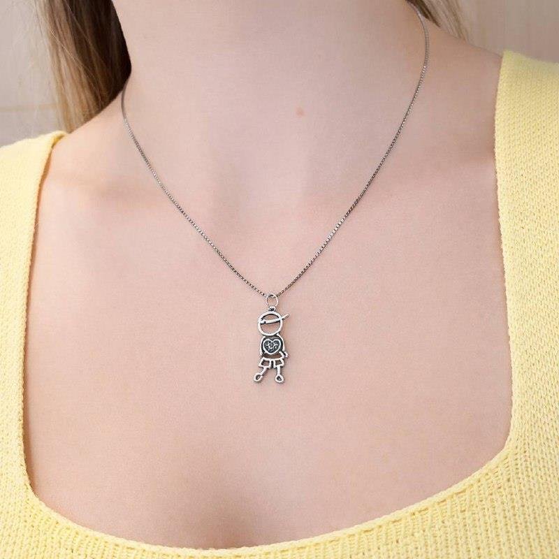 PINGENTE PRATA 925 BALI MENINO VAZADO ARTICULADO CORAÇÃO