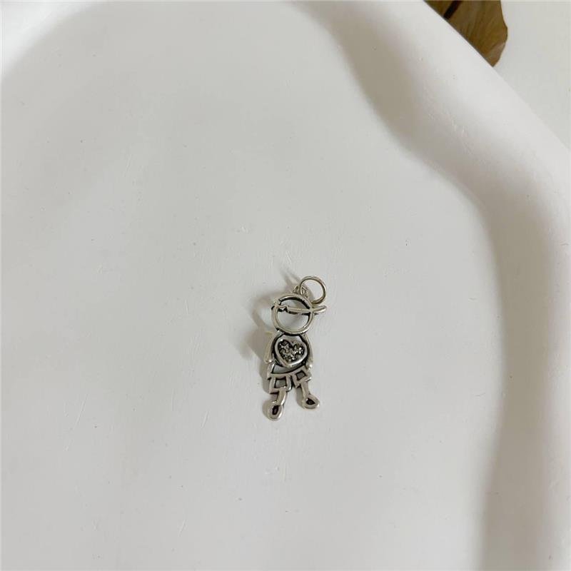 PINGENTE PRATA 925 BALI MENINO VAZADO ARTICULADO CORAÇÃO
