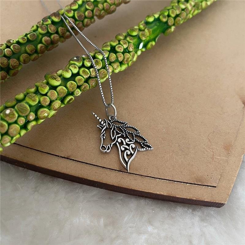 PINGENTE PRATA 925 UNICÓRNIO VAZADO LISO COM DETALHES PONTILHADOS