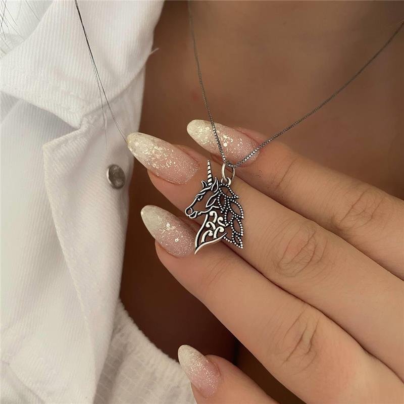 PINGENTE PRATA 925 UNICÓRNIO VAZADO LISO COM DETALHES PONTILHADOS