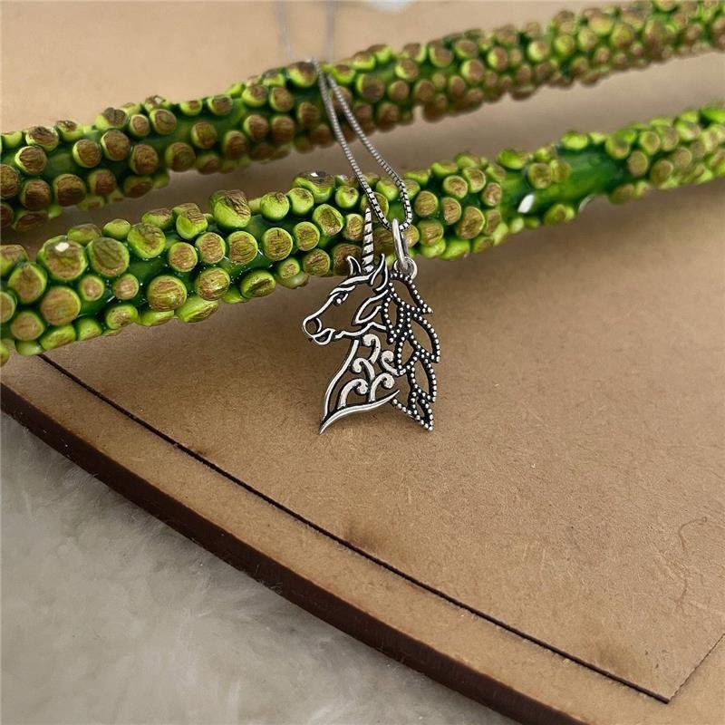 PINGENTE PRATA 925 UNICÓRNIO VAZADO LISO COM DETALHES PONTILHADOS