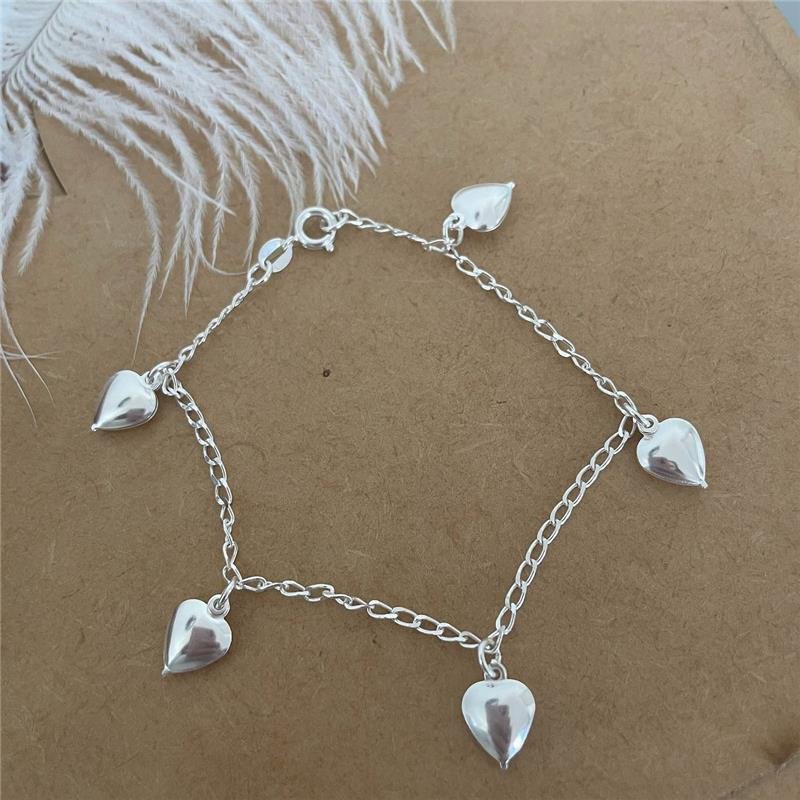 PULSEIRA CORAÇÕES PENDURADOS ABAULADOS 