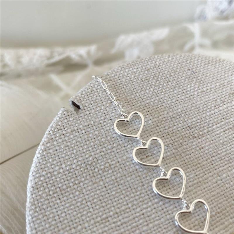 PULSEIRA PRATA 925 CINCO CORAÇÕES