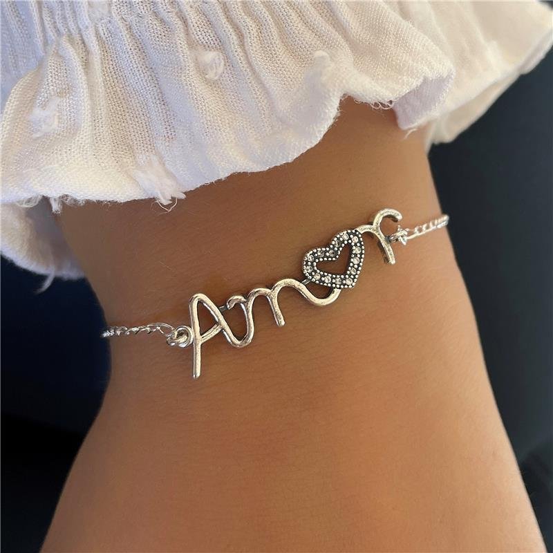 PULSEIRA PRATA 925 ESCRITA 'AMOR' COM ZIRCÔNIA