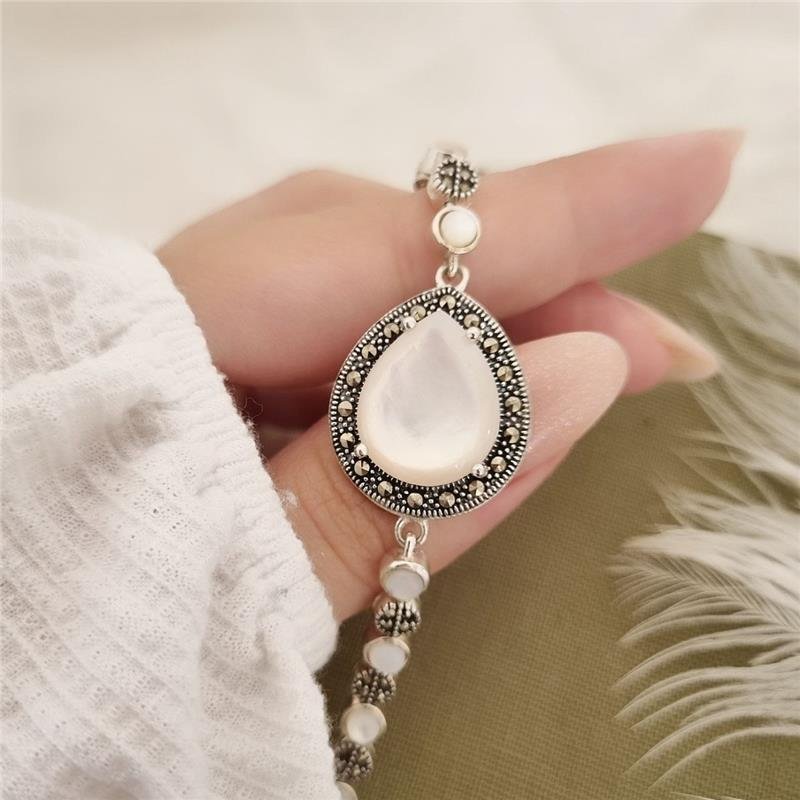 PULSEIRA PRATA 925 GOTA MADRE PÉROLA COM MARCASSITA