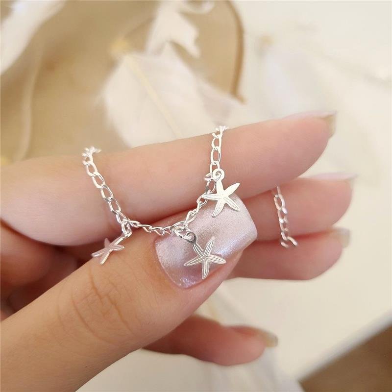 PULSEIRA PRATA 925 INFANTIL TRÊS ESTRELAS DO MAR