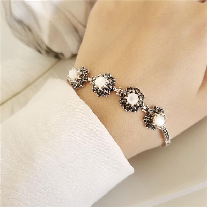 PULSEIRA PRATA 925 QUATRO FLORES MADRE PÉROLA