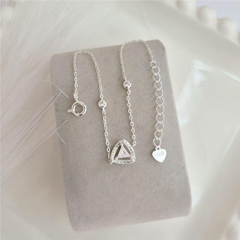 PULSEIRA PRATA 925 TRIÂNGULO CRAVEJADO PONTO LUZ