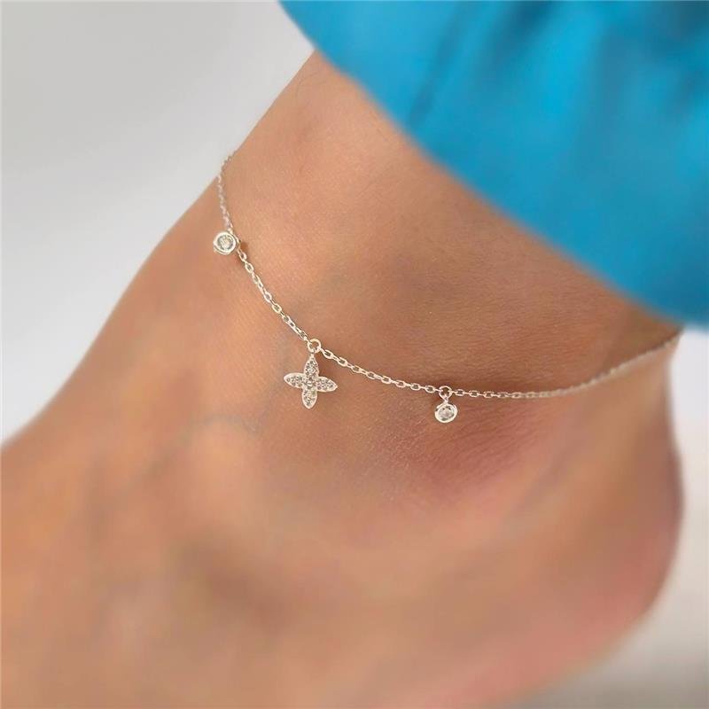 TORNOZELEIRA PRATA 925 FLORZINHA 4 PÉTALAS CRAVEJADA PONTO LUZ